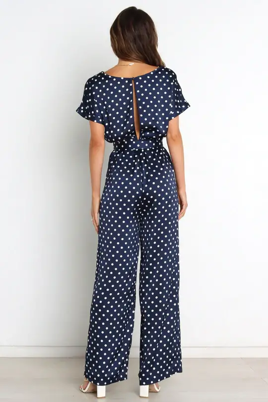 15 Wedding Guest Jumpsuits With Sleeves - Lillies and Lashes