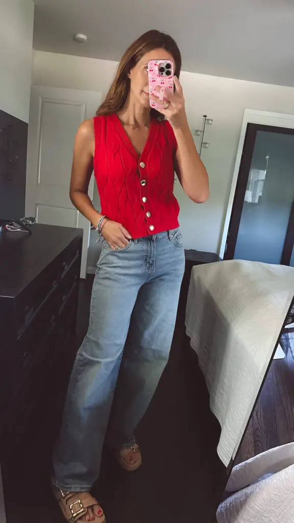 red sweater vest and high waisted jeans from target